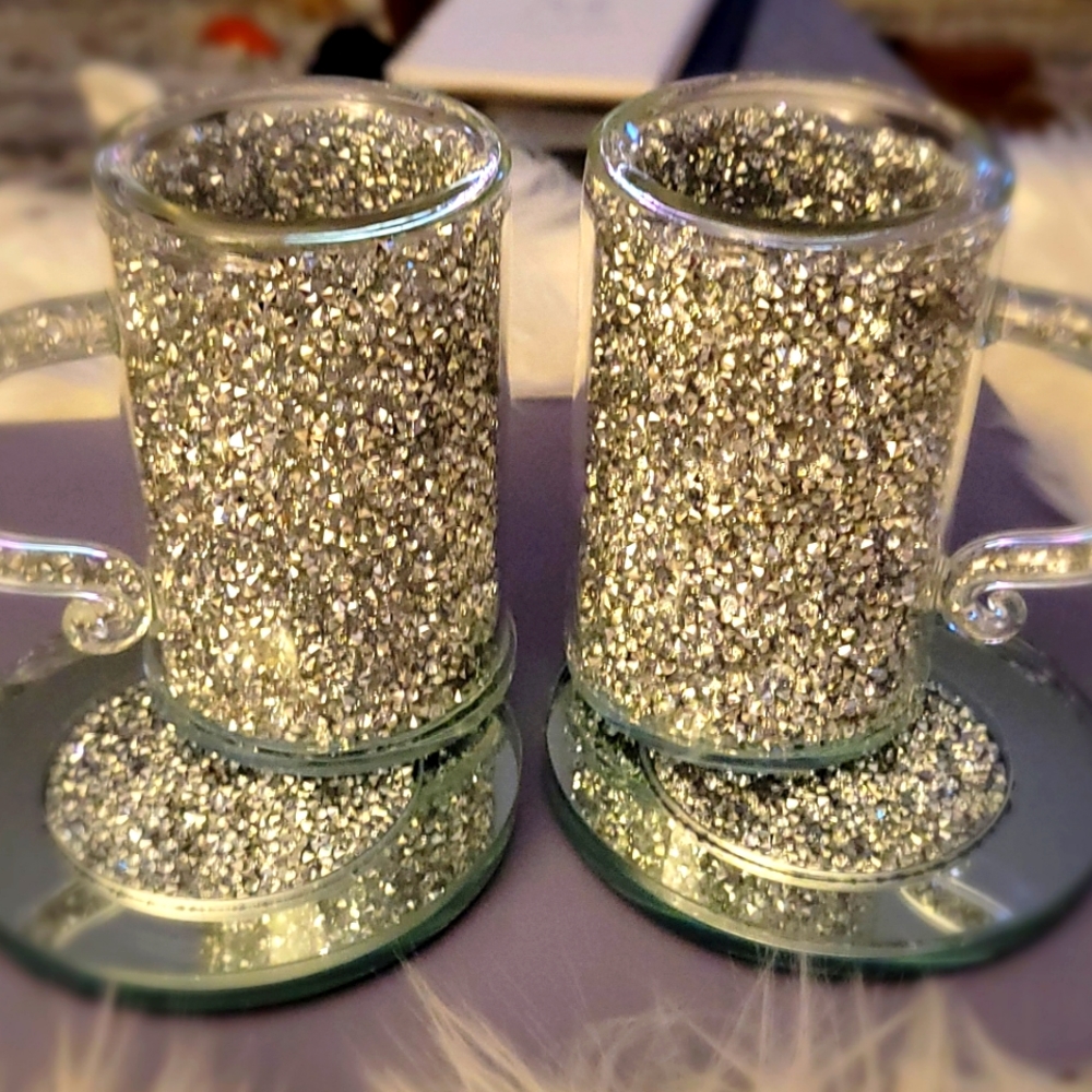 Crushed silver cup and coaster set.